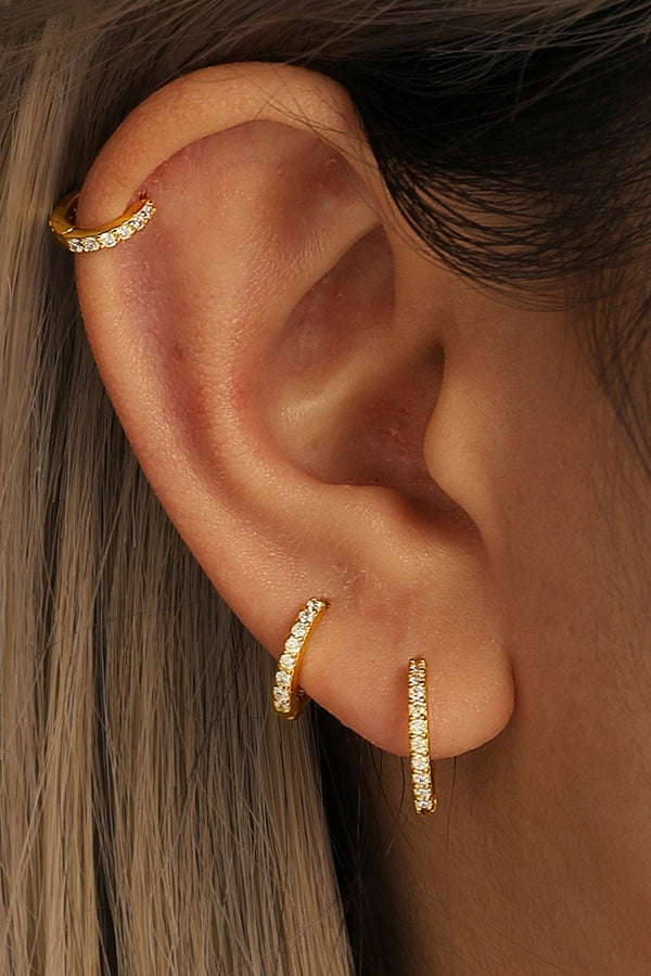 Anneliese – Goldene Creolen mit sanfter Rundung.