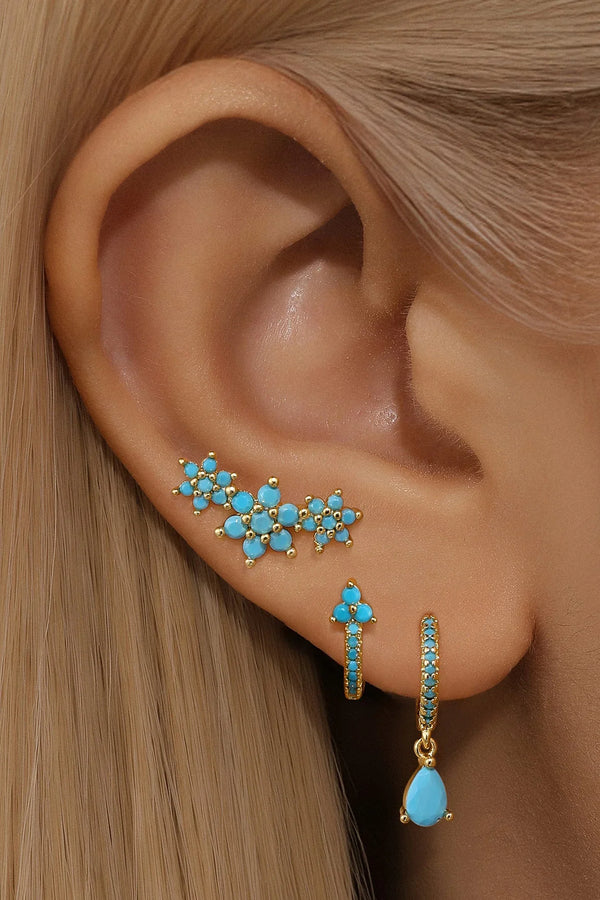 Victoria-Anne – Goldene Ohrringe mit moderner Silhouette.