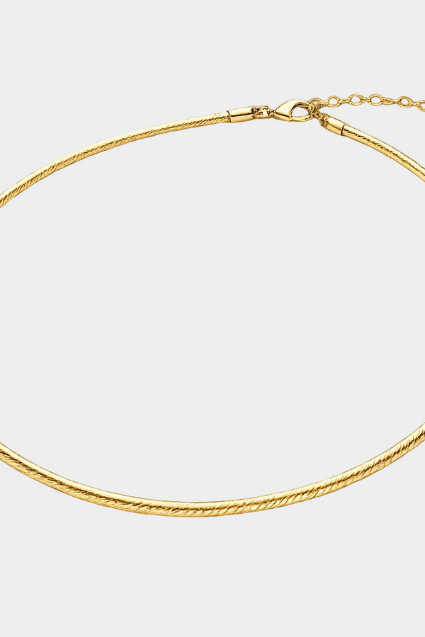 Theresa – Zarte, goldene Halskette mit rundem Detail.