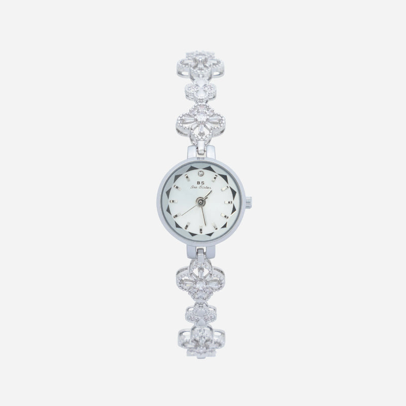Elina – Goldene Uhr mit floral inspiriertem Armband.
