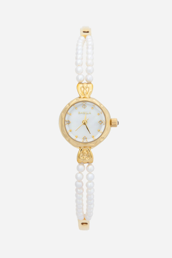 Johanna – Goldene Uhr mit Kristallrand.