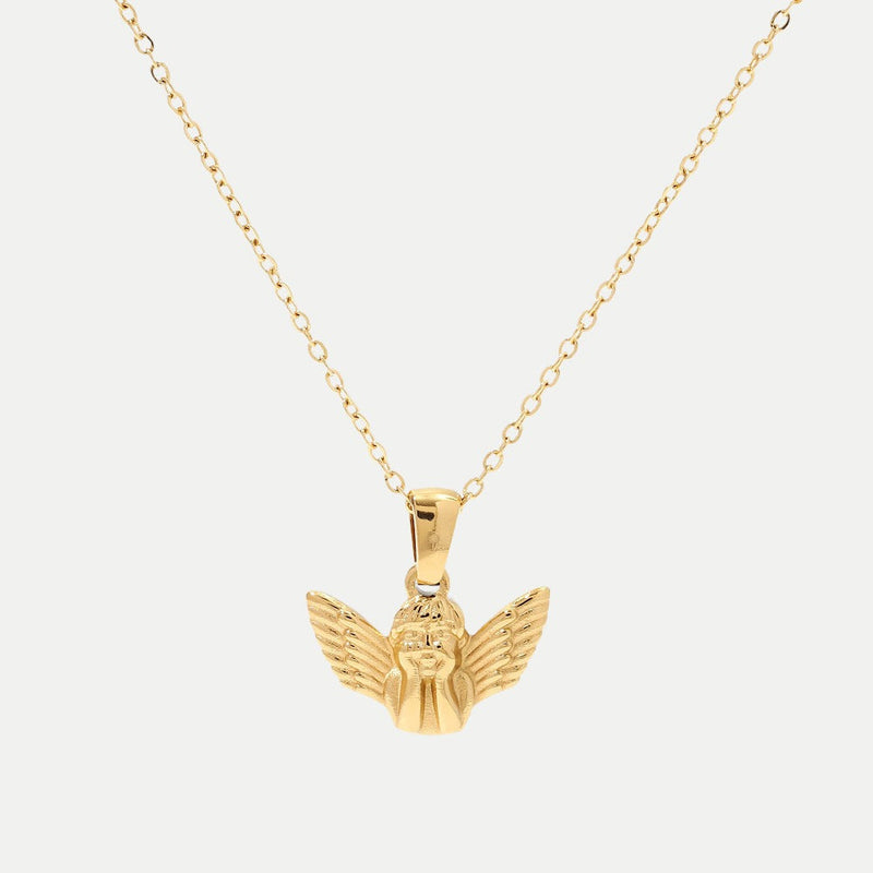 Frieda – Goldene Halskette mit Flügelanhänger.