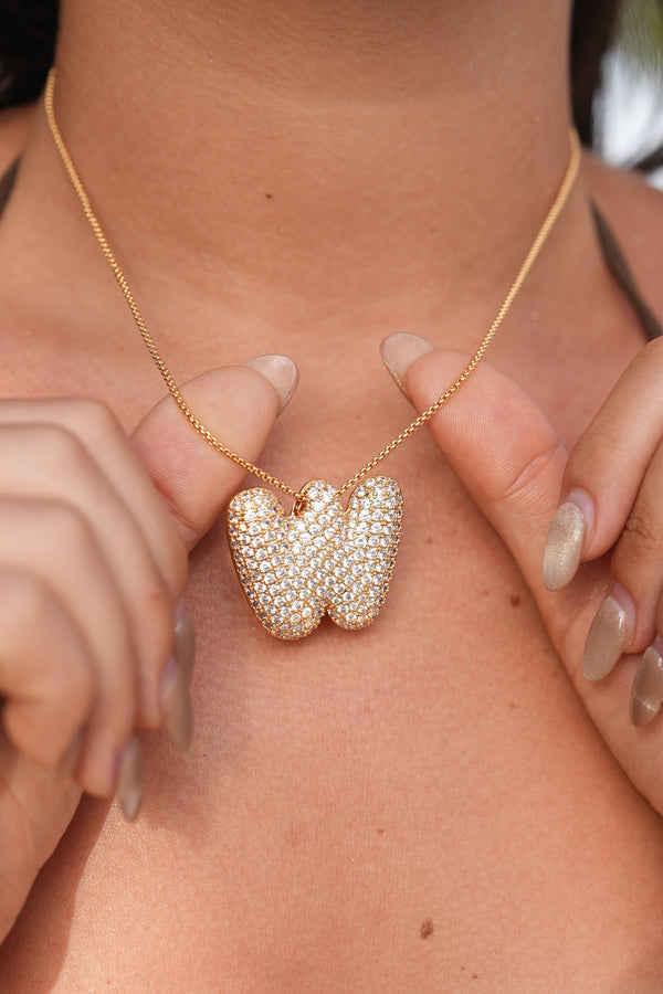 Melanie – Goldene Kette mit Doppelherz.