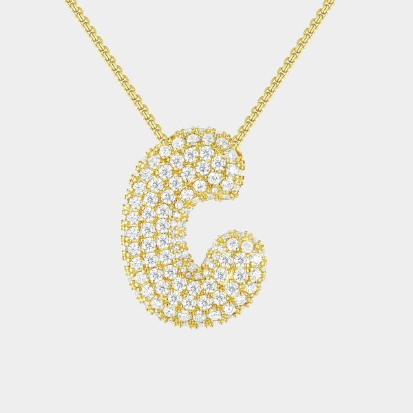 Frieda – Goldene Gliederkette mit organischem Anhänger.