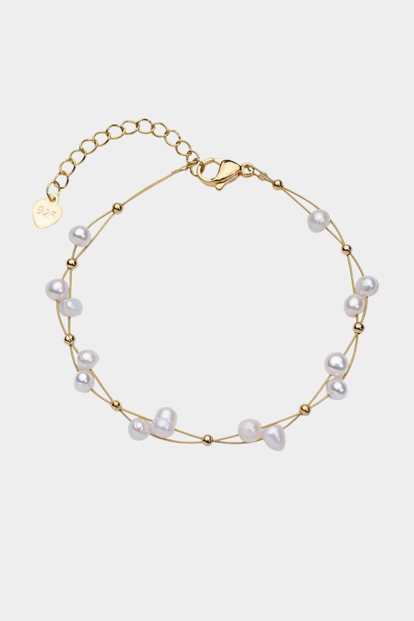 Marlene – Goldarmband mit einzelnen Perlenakzenten.