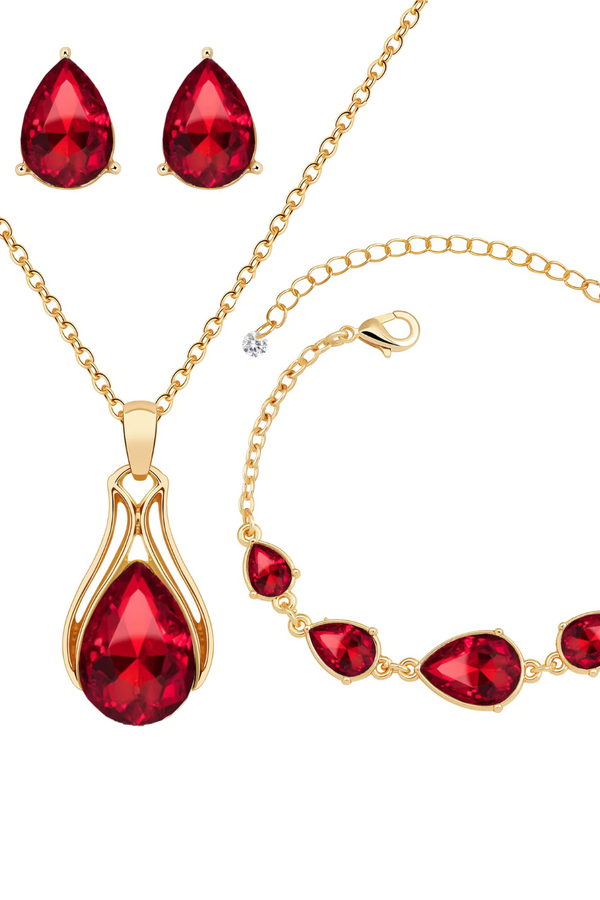 Selma – Rubin-Set mit goldenen Akzenten.