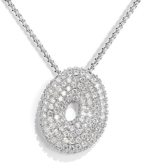 Frieda – Goldene Gliederkette mit organischem Anhänger.