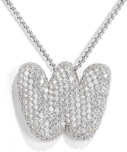 Frieda – Goldene Gliederkette mit organischem Anhänger.