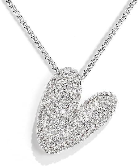 Frieda – Goldene Gliederkette mit organischem Anhänger.