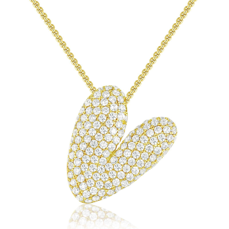 Frieda – Goldene Gliederkette mit organischem Anhänger.