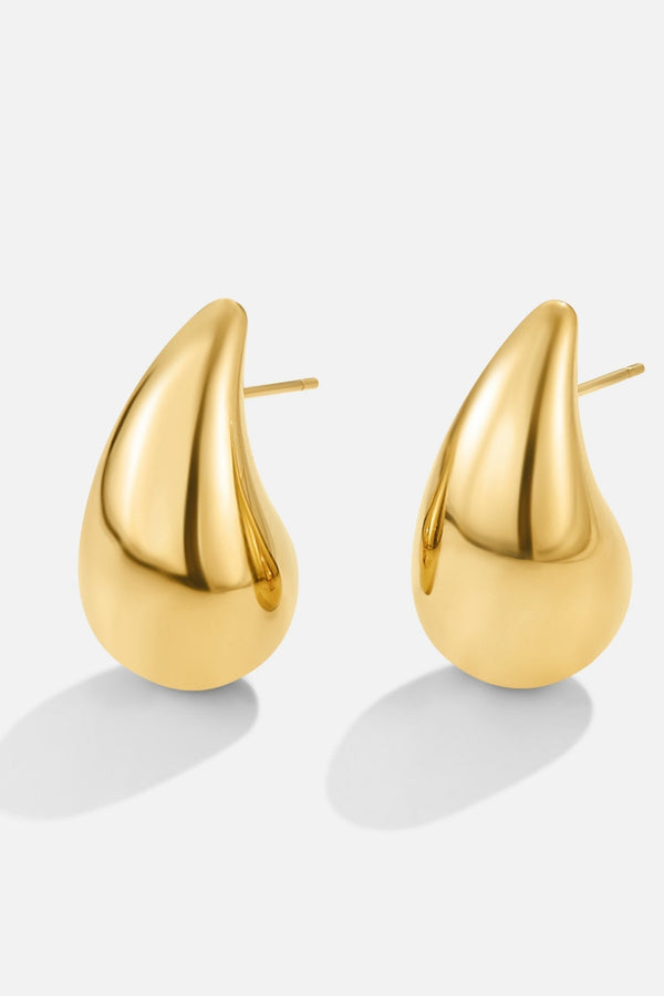 Anja – Goldene Creolen mit weicher Rundung.