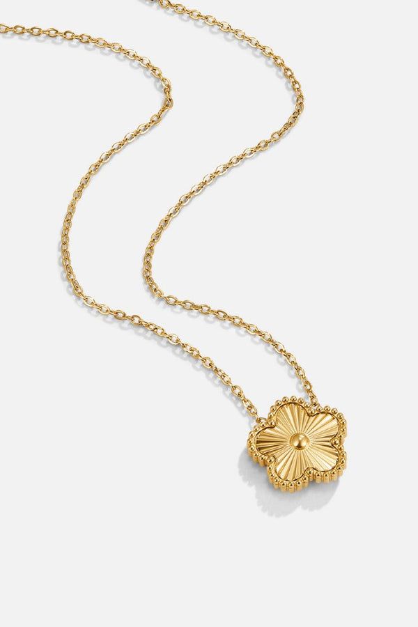 Nadine – Goldene Kette mit runde-medaillon-Form.