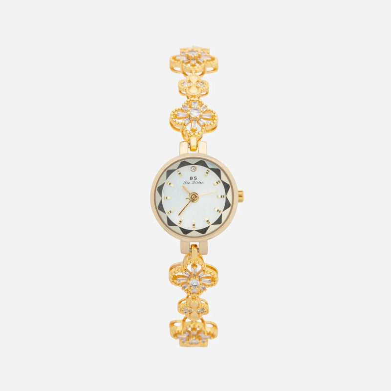 Elina – Goldene Uhr mit floral inspiriertem Armband.