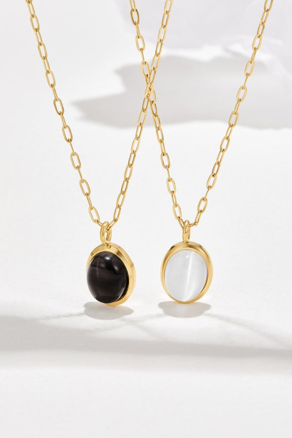 Verena – Goldene Doppelkette mit schwarzen Akzenten.